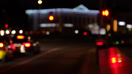 Night city street with traffic lights and blurred car headlights, urban scene with colorful reflections and bokeh effect
- Powered by Adobe