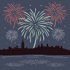 Fireworks illuminate the night sky over the city during a celebration