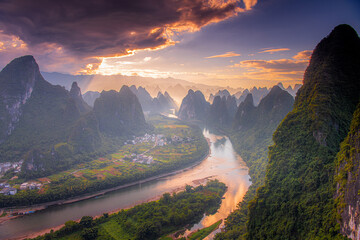 Panoramic sunrise over the Karst mountain natural landscape from Xianggong Mountain, with cloudy sky, Guilin, Guangxi, China.