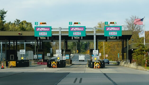 Clark Summit, Pennsylvania, U.S - Oct 19, 2025 - E-ZPass toll plaza featuring three active electronic toll lanes marked 1, 2, and