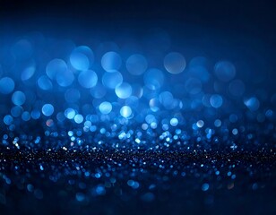 Dreamy blue background with bokeh effect and sparkling surface texture