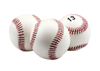 Three baseballs with red stitching on a dark background