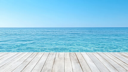 Serene ocean view with clear blue water and wooden deck under bright sky