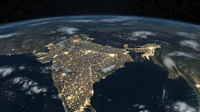 Satellite view of India at night, showing illuminated cities and coastlines from space