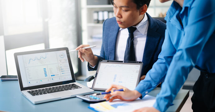 Business team collaboration discussing working analyzing with financial data and marketing growth report graph in team, presentation