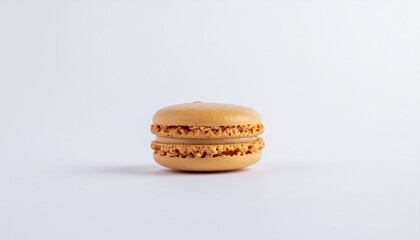 Three Macarons in Soft orange Colors Isolated on White