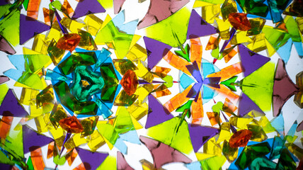 Stunning macro photograph of a natural kaleidoscope pattern, showcasing vibrant colored glass and...