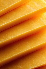 Stacked Slices of Cheddar Cheese with Clear Edges and Shadows
