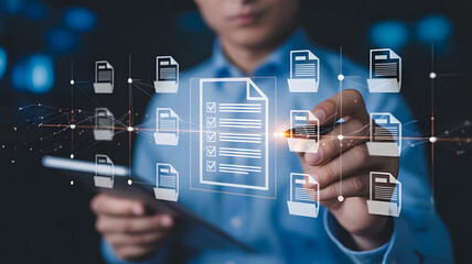 Person interacting with a digital interface showcasing a network of document icons representing data management and information organization