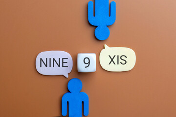 Two figures viewing a dice showing the number 9 with speech bubbles reading NINE and SIX. Different perspectives, miscommunication, disagreement, or misunderstanding concept.