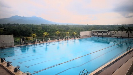 Mountain View Outdoor Swimming Pool in Tropical Landscape