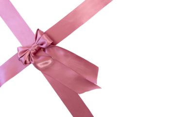 Top view of a gift ornament made of pink ribbon forming a cross and bow. Transparent background, PNG format.