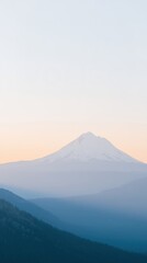 Naklejka premium Silent mountains glow with morning light, Soft morning light enhances peaceful mountain silhouettes at sunrise, Calm and serene mountain outlines bathed in gentle glow of early morning