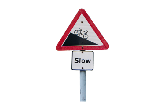 Black and white aluminum warning sign Drive slowly because road is steep. Bicycle icon and slow text isolated on cutout PNG or transparent background.  Regulatory signs for vehicular traffic.