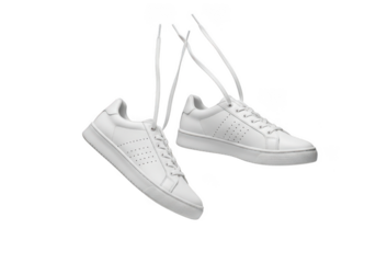 Floating white sneakers with laces, fashionable footwear, stylish casual shoes for men and women, png image isolated on transparent background