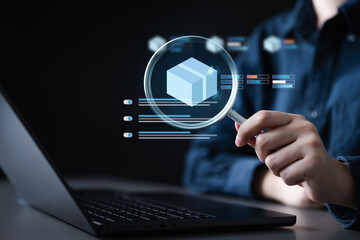 Person analyzing inventory data on a laptop with a digital magnifying glass highlighting a product box icon, symbolizing stock tracking, warehouse management, and inventory alerts.