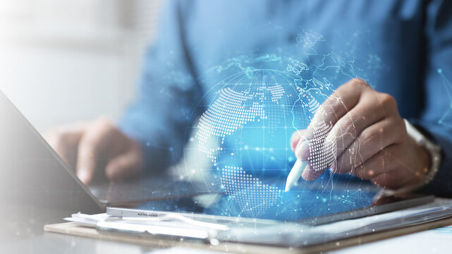 digital, transformation, network, Businessperson using tablet with digital globe hologram, representing digital transformation, enterprise resource planning, and global business network integration.