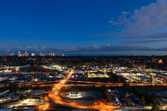 Dusk Cityscape Over Surrey: Night Lights, Busy Roads, and Urban Skyline at Twilight