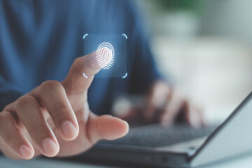 Cybersecurity concept with a person using fingerprint scanning for digital authentication and data...