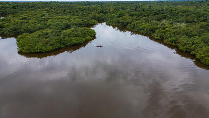 Drone image of the Nanay River in the Amazon rainforest of Iquitos, Peru  a blackwater (igapó)...