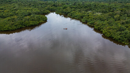 Drone image of the Nanay River in the Amazon rainforest of Iquitos, Peru  a blackwater (igapó)...