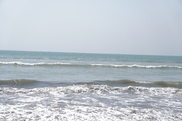 Peaceful ocean waves on a sunny day