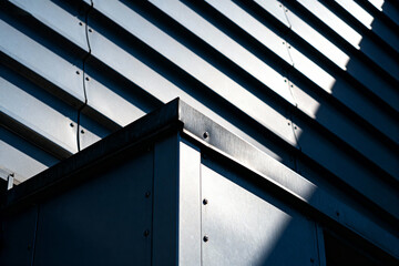 Obraz premium Close-up of modern building exterior with metallic panels