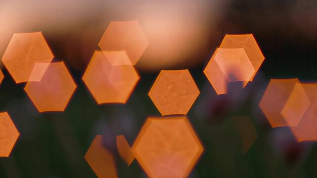 Soft Pink And Orange Hexagonal Bokeh Background With Cinematic Dreamy Glowing Shimmer