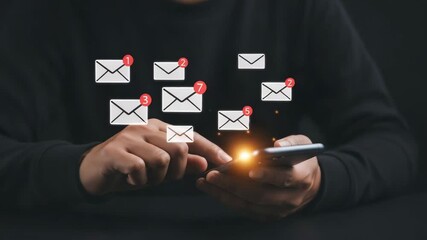 Man using smartphone with email icon, concept of business communication - Powered by Adobe