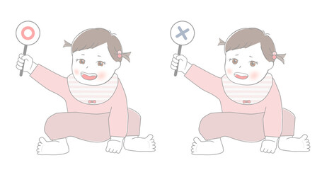 正解と不正解の札を持った赤ちゃん