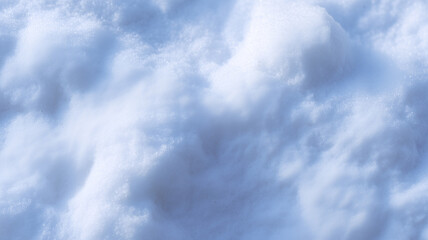 Obraz premium Soft white snow texture with fluffy surface, close up top view showing natural winter background and cold atmosphere, perfect for seasonal and holiday themes