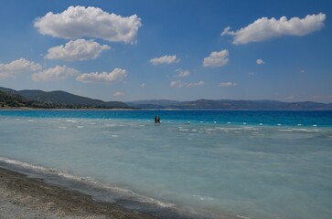 T&uuml;rkiye, Lake Salda, August 24, 2025  people on the azure and blue lake of Salda