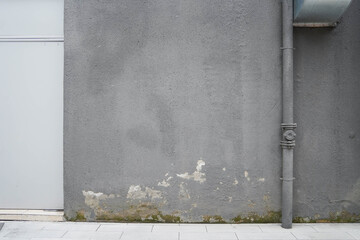 Clean Aged Concrete Grey Street Wide Wall and Sidewalk Floor with pipe.