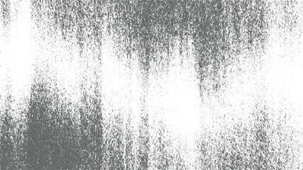 textured background with scattered grey speckles on white surface, creating grainy effect.