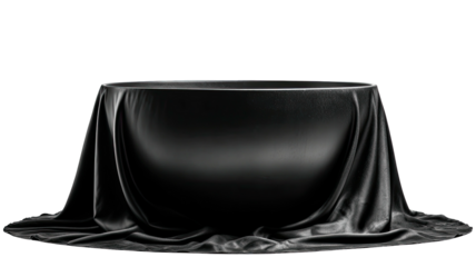 Black draped table against black backdrop