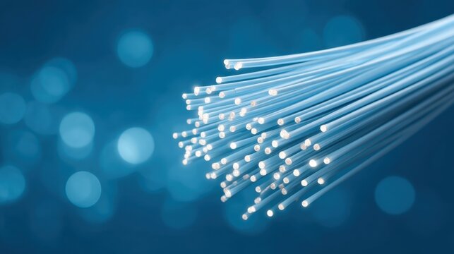 Illuminated Fiber Optic Cables Network on Soft Blue Background with Glowing Lights and Abstract Bokeh Effects for Technology Illustrations
