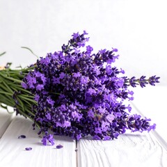 Fototapeta premium A bunch of fragrant purple flower blooms on white wood
