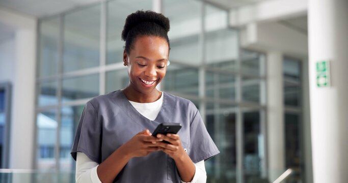 Smartphone, surgeon and black woman in hospital, healthcare and digital app for online schedule. African person, medical service or nurse in clinic, cellphone and chatting with smile or communication