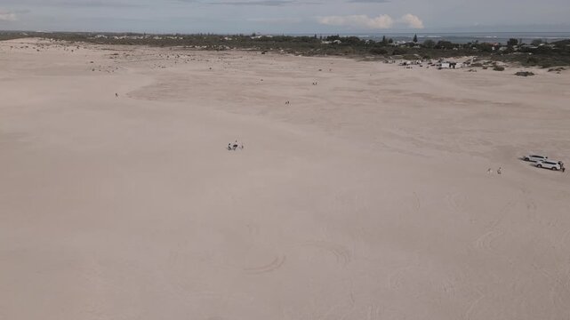 Aerial footage in the Lancelin Sand Dunes, showing an advance towards the Indian Ocean in Perth, Western Australia.