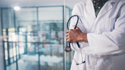Stethoscope, hands or doctor with arms crossed in clinic, healthcare professional or cardiology...