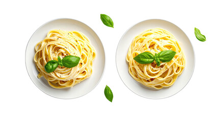 Two plates of spaghetti with creamy sauce and basil leaves