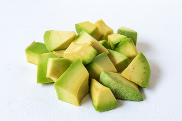 diced avocado on a white background, Avocado slices