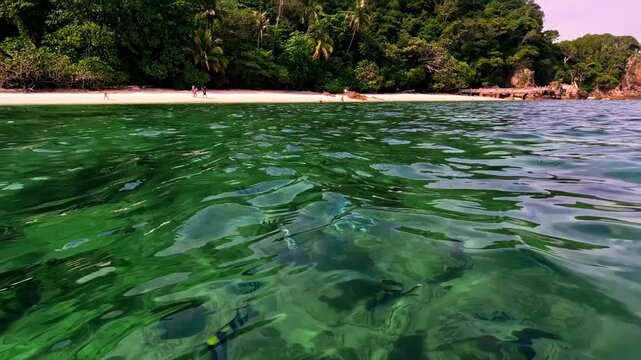 View from underwater to the island in Pulau Kapas