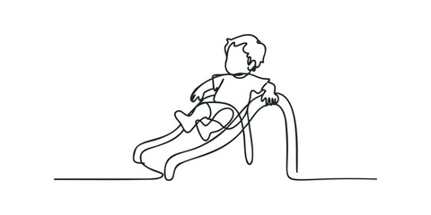 Fototapeta premium Child enjoying playground slide