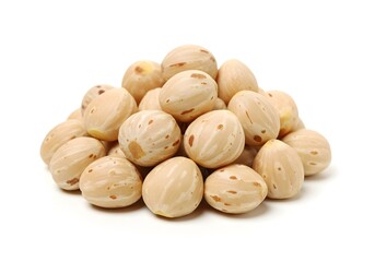 Fototapeta premium Small pile of raw, spotted pale beige Gac fruit seeds.