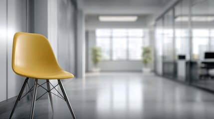 Beautiful photo of modern office background, softly blurred, minimal design, soft grey tones with a yellow chair in the distance, ambient light, clean atmosphere.