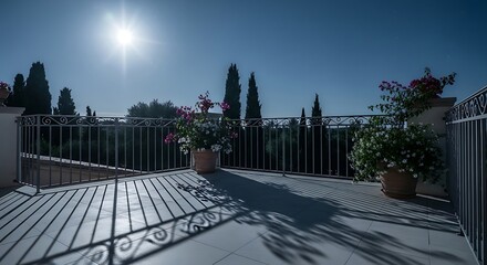 Idyllic balcony scenery under the sun with flowers and wrought iron