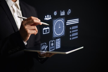 Businessman using digital tablet with virtual task icons for time management, project planning, productivity, team collaboration data analysis in modern workplace or remote work setting.