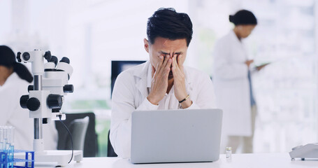 Man, scientist or laptop with stress in laboratory for forensic research, fail or mistake. Male...