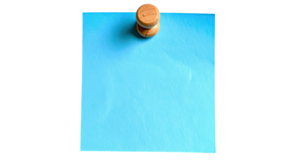 Blue paper note pinned by wooden tack to blank dark backdrop